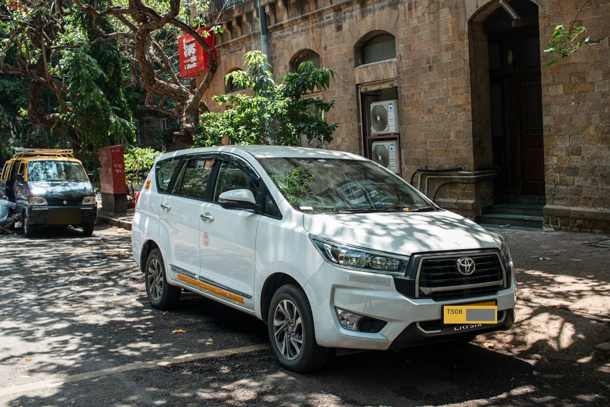 Chauffeur-driven cab ready for a journey in India